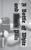 A Bottle Of White And Black Pills