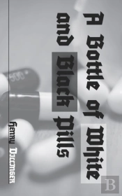 A Bottle Of White And Black Pills