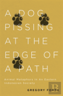 A Dog Pissing At The Edge Of A Path