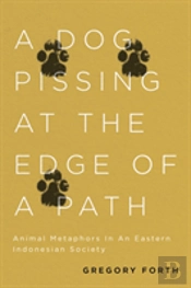 A Dog Pissing At The Edge Of A Path