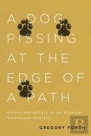 A Dog Pissing At The Edge Of A Path