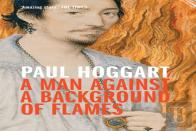 A Man Against A Background Of Flames