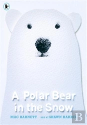 A Polar Bear In The Snow