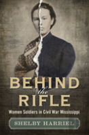 Behind The Rifle