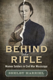 Behind The Rifle