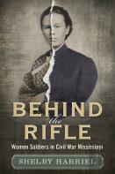 Behind The Rifle