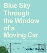 Blue Sky Through The Window Of A Moving Car