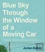 Blue Sky Through The Window Of A Moving Car