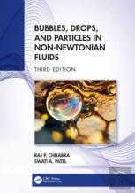 Bubbles, Drops, And Particles In Non-Newtonian Fluids