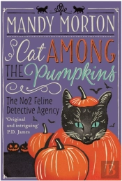 Cat Among The Pumpkins