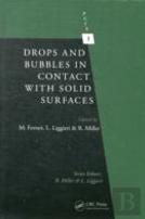 Drops And Bubbles In Contact With Solid Surfaces
