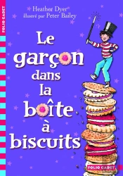Le Garçon Dans La Boîte De Biscuits