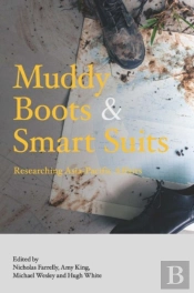 Muddy Boots And Smart Suits