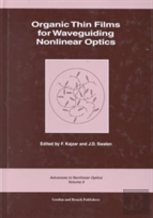 Organic Thin Films For Waveguiding Nonlinear Optics