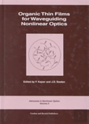 Organic Thin Films For Waveguiding Nonlinear Optics