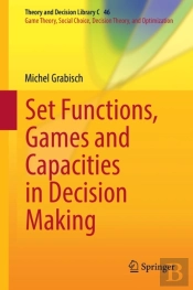 Set Functions, Games And Capacities In Decision Making