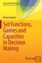Set Functions, Games And Capacities In Decision Making