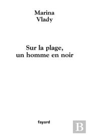 Sur La Plage, Un Homme En Noir