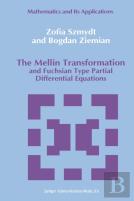 The Mellin Transformation And Fuchsian Type Partial Differential Equations