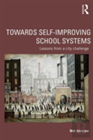 Towards Self-Improving School Systems