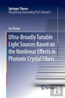 Ultra-Broadly Tunable Light Sources Based On The Nonlinear Effects In Photonic Crystal Fibers