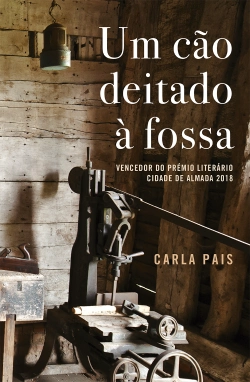 Bertrand.pt - Um Cão Deitado à Fossa